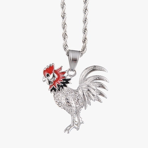 Detail of silver rooster pendant with red enamel, white cubic zirconia, and twist chain