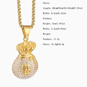 Detail view of gold money bag pendant with dimensions 5x2.4cm and box chain specs