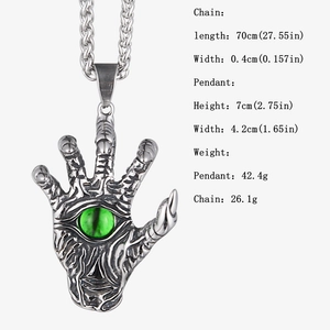 Detailed view of evil eye skull hand pendant with 70cm chain and product measurements