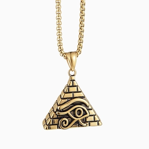 Vintage gold Eye of Horus pyramid pendant necklace in stainless steel on white backdrop