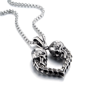 Collar con colgante de corazón de calavera gótica en acero inoxidable plateado