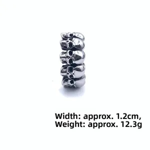 Detail view of vintage skull ring showing 1.2cm width and 12.3g weight parameters