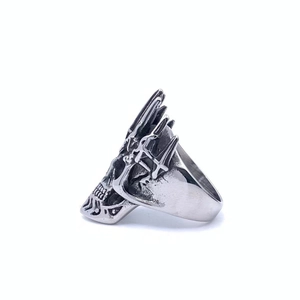 Detail view of gothic skull ring with vintage silver finish and black aged texture