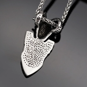 Viking compass arrow pendant with ram horns on a metallic dragon bone chain necklace