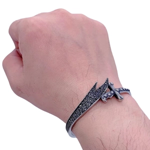 Gothic silver-tone sword cuff bracelet for men set with black rhinestones on wrist