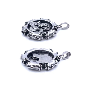 Close-up of steampunk silver gear pendant showing intricate mechanical clockwork details
