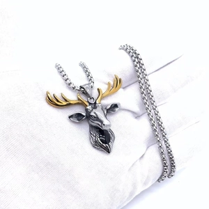 Hip hop titanium steel necklace featuring a silver elk head pendant with golden antlers