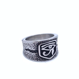 Detail of vintage Eye of Horus ring featuring hammered texture and oxidized silver finish