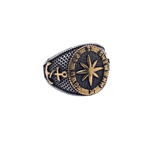 Men's titanium steel compass ring with gold star and nautical anchor motif on white background