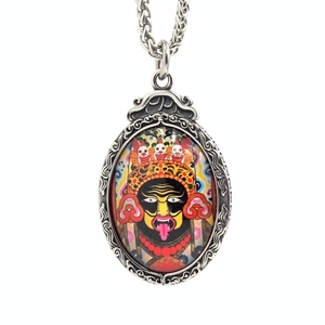 Oval Thangka pendant necklace with vintage pattern and colorful religious illustration