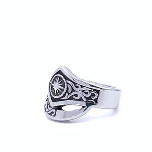 Retro titanium steel ring for men featuring starburst design and vintage tribal patterns