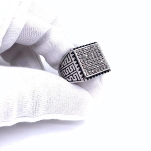 Men's titanium steel ring with black gemstone inlay and Greek meander pattern