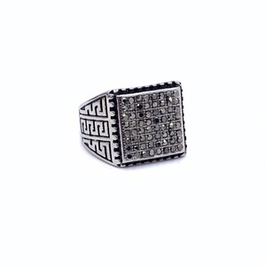 Vintage stainless steel ring with black stones and Greek key patterns on sides