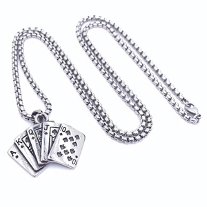 Macro view of vintage royal flush poker cards pendant with distressed steel finish