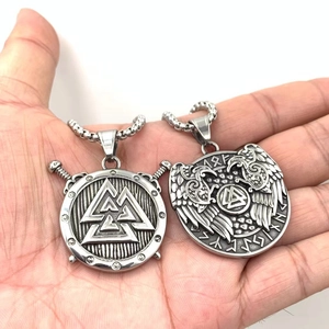 Viking Valknut and raven pendants in vintage stainless steel on a beaded chain