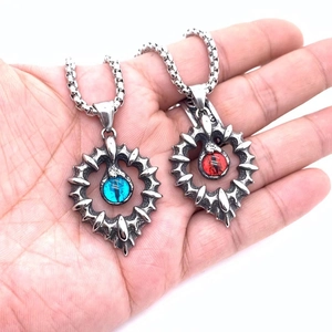 Gothic punk heart pendants with blue and red eyes on stainless steel necklaces