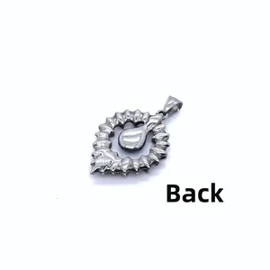 Back view of a retro industrial style stainless steel pendant with gear edge design