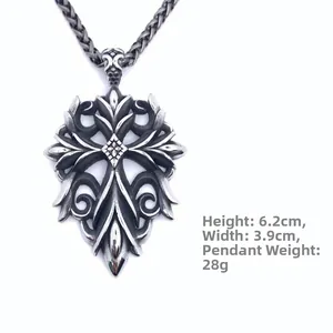 Detail of vintage steel cross pendant showing dimensions 6.2cm height and 3.9cm width