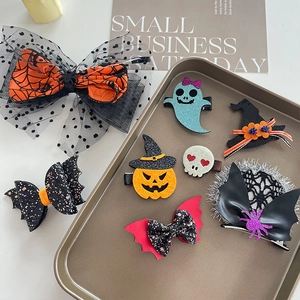 Halloween hair clip set featuring pumpkin, ghost, and bat designs for kids party