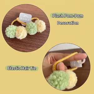 Cute high-elastic hair tie for girls featuring colorful soft plush pompom decorations