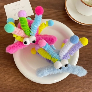 Pinces à cheveux en peluche arc-en-ciel avec grands yeux et antennes colorées en rose et bleu