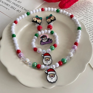 Christmas jewelry set for kids with Santa Claus pendant necklace, bracelet, and ring