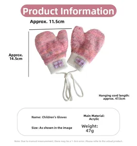 Detail of pink knitted toddler mittens with white neck string and ribbed cuffs