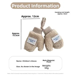 Detail view of cream plush kids mittens with size chart showing 12x15.5cm dimensions
