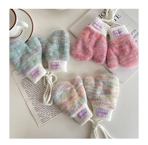 Detailed view of thick knitted infant mittens with soft fleece and anti-lost strings