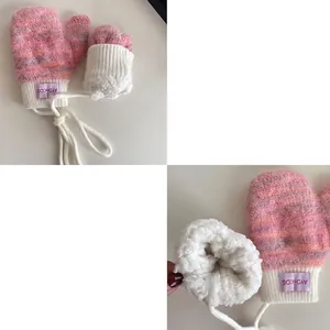 Thickened pink knitted baby gloves with warm plush lining and neck strap for toddlers