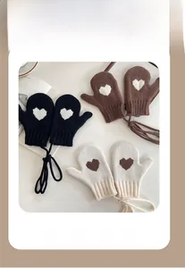Three-pack knit mittens for kids with heart patterns and anti-lost neck strings