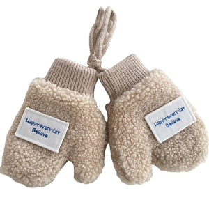 Creamy white fleece toddler mittens with letter patch and neck string for warm comfort