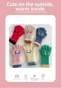 Detailed close-up of six-color knit gloves for children featuring embroidered smiley faces
