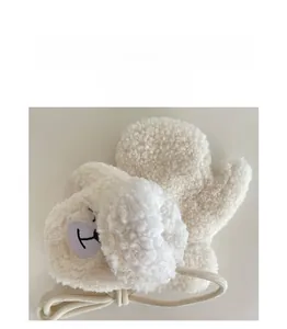Detail of white fleece toddler gloves with cute bear embroidery and hanging neck strap