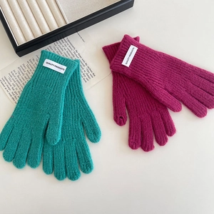 Winter children's thick knitted gloves in teal and rose red with rib texture and quality labels