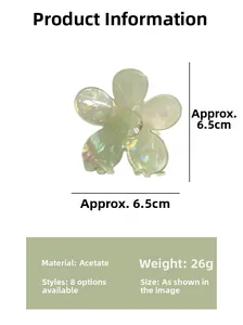Détail d'une pince à cheveux fleurie en acétate vert de 6,5 cm avec finition nacrée et dimensions