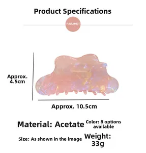 Cloud shape hair claw clip in iridescent pink marble acetate showing 10.5cm length