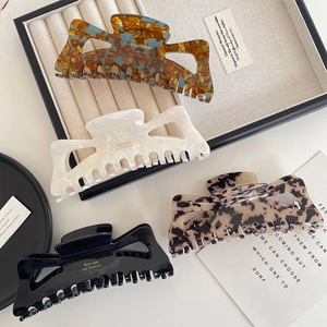 Large acetate bow hollow claw clips in tortoiseshell, marble white, leopard, and black