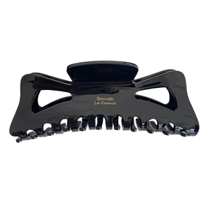 Large black acetate hair claw clip with golden Borrette La France logo for thick hair