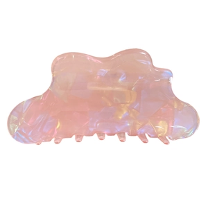 Pink iridescent cloud hair claw clip with pearlescent finish and acetate texture