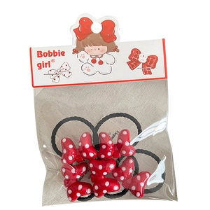 Red polka dot bow hair ties for girls with cute resin accents and elastic bands