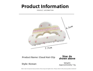 Détails de la pince à cheveux nuage avec dimensions 7,7cm x 4,3cm et motif floral à carreaux