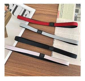 Close-up of four colorful elastic sports headbands featuring non-slip silicone inner grips