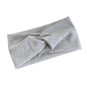 Minimalist light gray twisted cotton sports headband with ribbed texture on white background