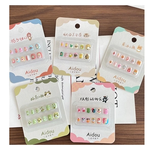 Close-up of five colorful 3D cartoon animal nail art sets for little girls