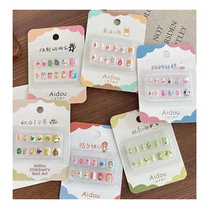 Detailed view of colorful 3D cartoon animal nail art stickers for kids in retail packs