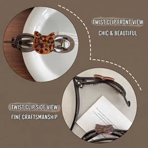 Cute leopard print cat ear hair clip with dark translucent finish and twist claw design