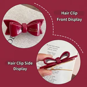 Barrette à double nœud en acétate rouge foncé avec lettrage doré France Handmade