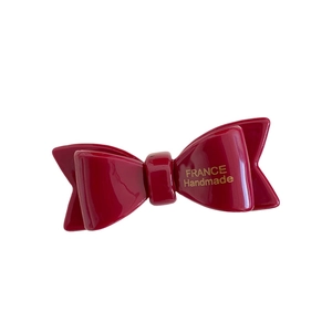 Barrette nœud double en acétate rouge élégante avec lettrage doré France Handmade