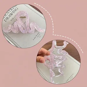 Pince à cheveux française en acrylique avec motif de vagues rose aurore boréale